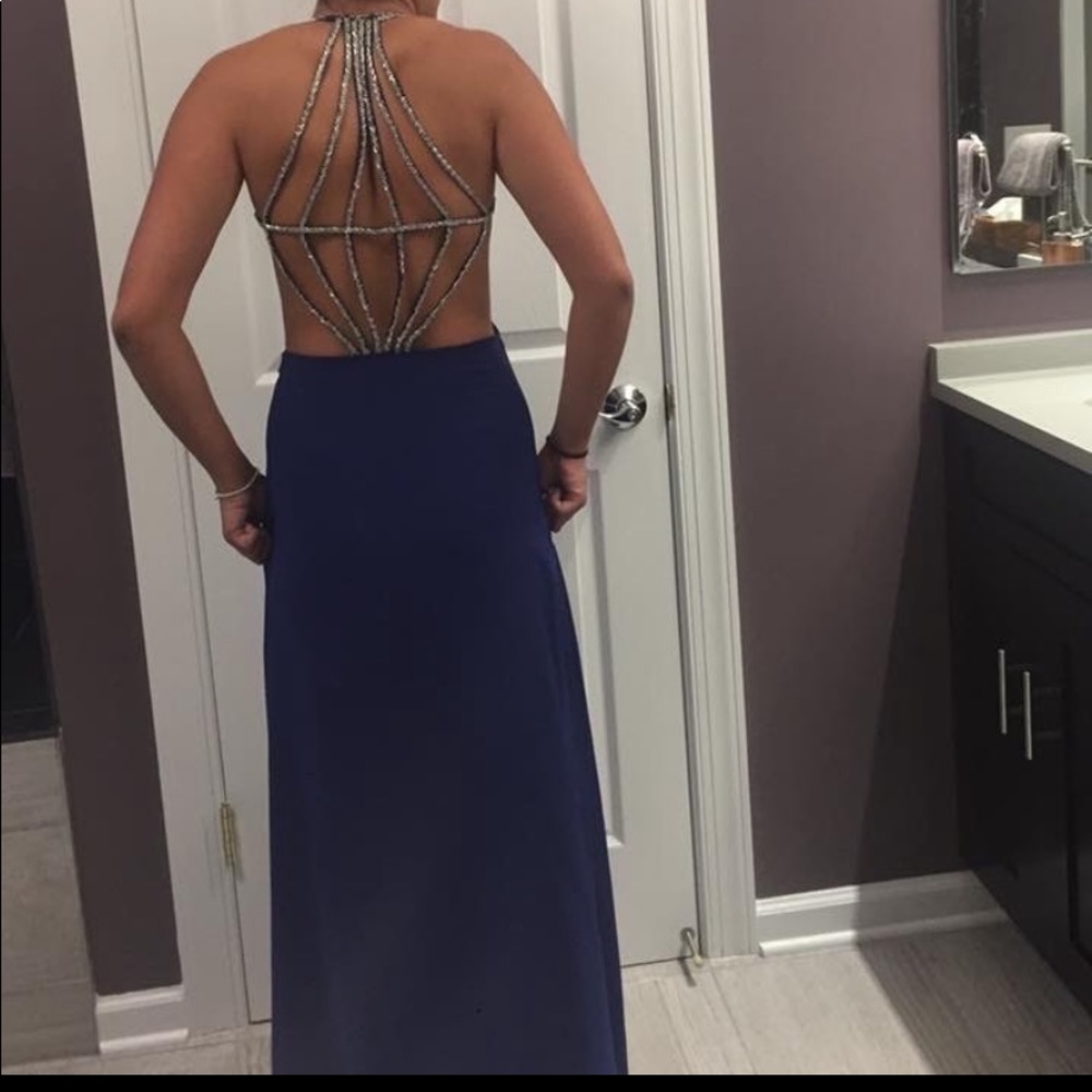Dark blue prom dress with diamond back